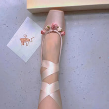 adult womens pink ballet flats with flowers and criss cross laces