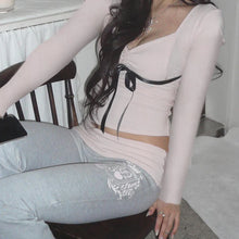 y2k soft girl outfits coquette clothing brands pink fold over leggings and pink long sleeve top matching set