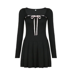 black and white dress with pink bow Black Dress with White Bows Francis + Fern
