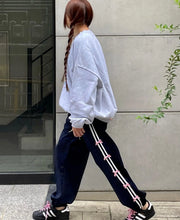 korean fashion blokette coquette outfit side stripe navy blue sweatpants with pink bows adidas samba