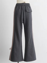 womens flared gray swetapants with pink bows back 