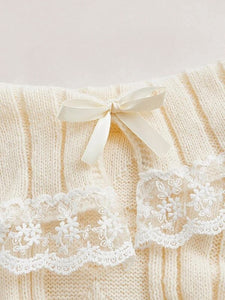 white off the shoulder sweater bow detail