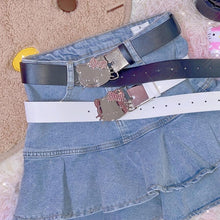 y2k outfit ideas navy blue and white hello kitty belt with ruffle denim skirt