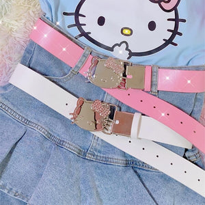 y2k outfit ideas pink and white hello kitty belt with ruffle denim skirt