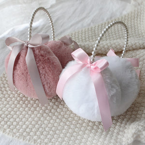 pink and white fur ear muffs with pearl headband and bows