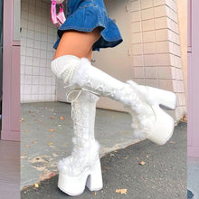 white fluffy boots